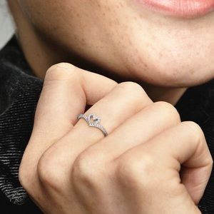 Authentic Pandora sterling silver sparkling wishbone heart ring.